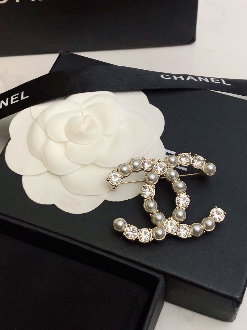 Ch**el brooches